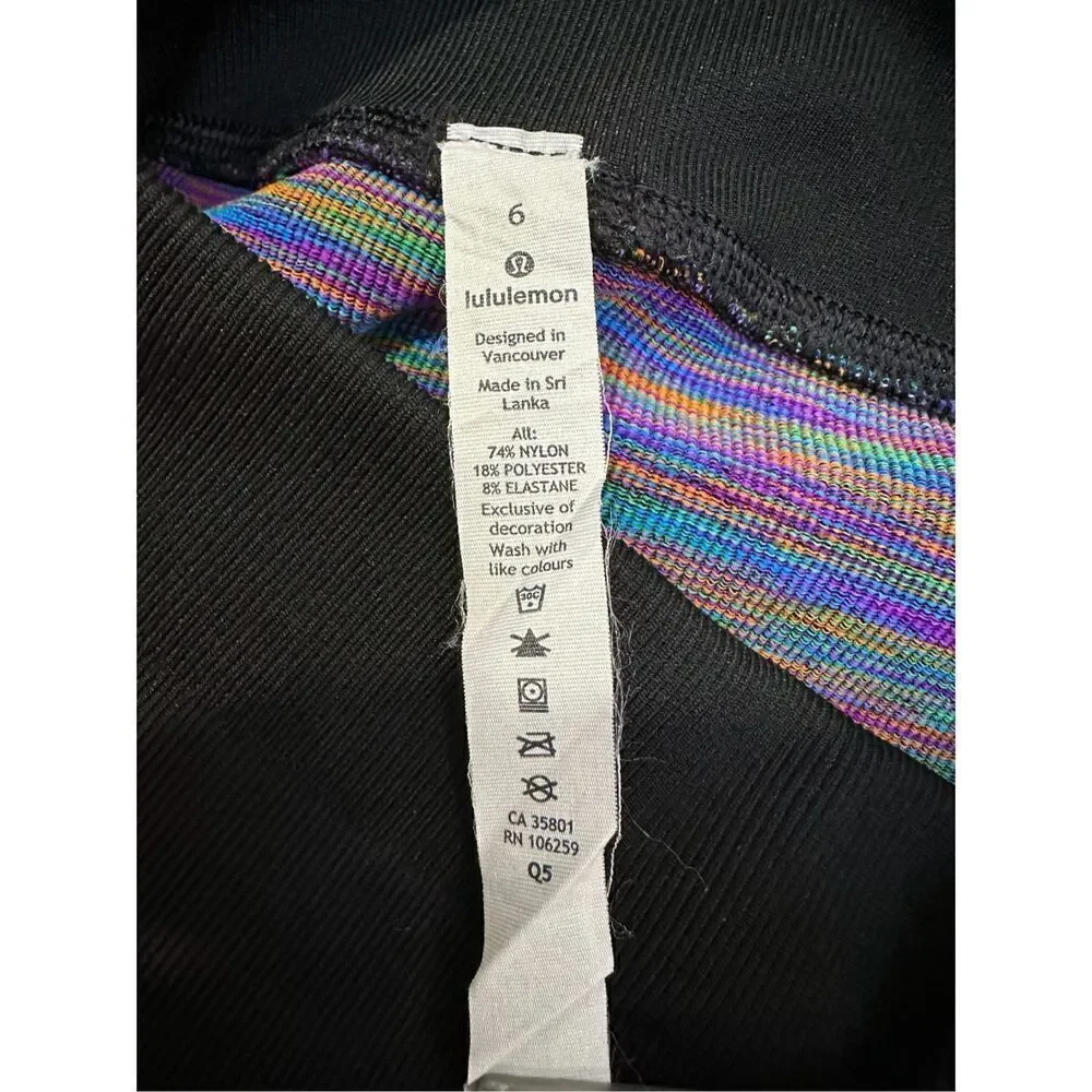 Lululemon women’s black leggings multicolor striping legs size 6/28. #16-1597